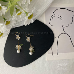 Floral Pearl Dangle earrings, Pearl drop earrings with delicate white flowers, unique wedding bridesmaid earrings